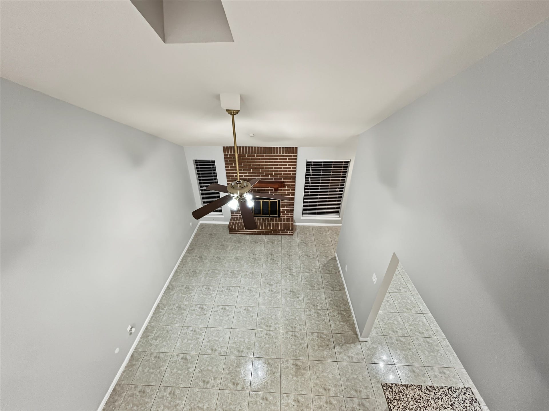 13768 Hollowgreen Drive, #510, Houston, TX 77082 View from the loft to the living room and kitchen.