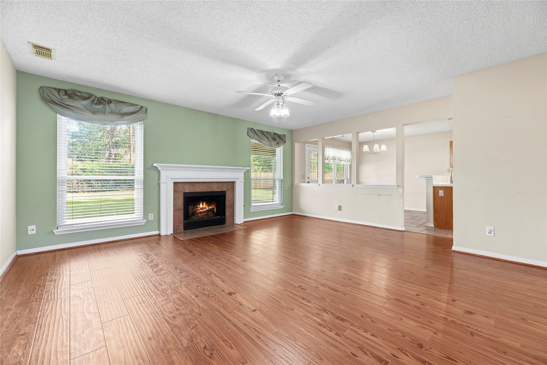 9922 W Cedaredge Drive, Houston, TX 77064 Living room seamlessly flows into the kitchen area.