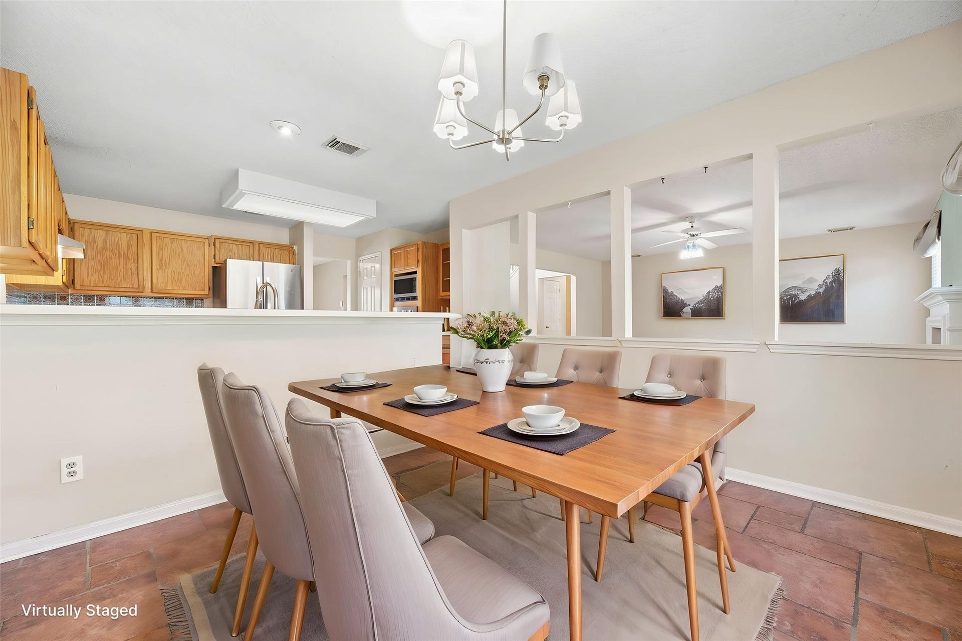 9922 W Cedaredge Drive, Houston, TX 77064 Virtually Staged -- 2nd view of the spacious breakfast area that connects to the kitchen and is open to the living room.
