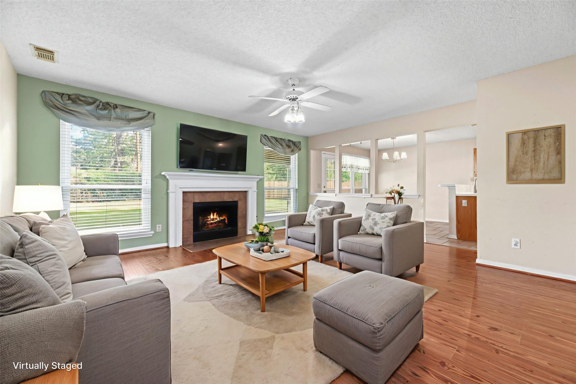 9922 W Cedaredge Drive, Houston, TX 77064 Virtually Staged --Living room seamlessly flows into the kitchen area.