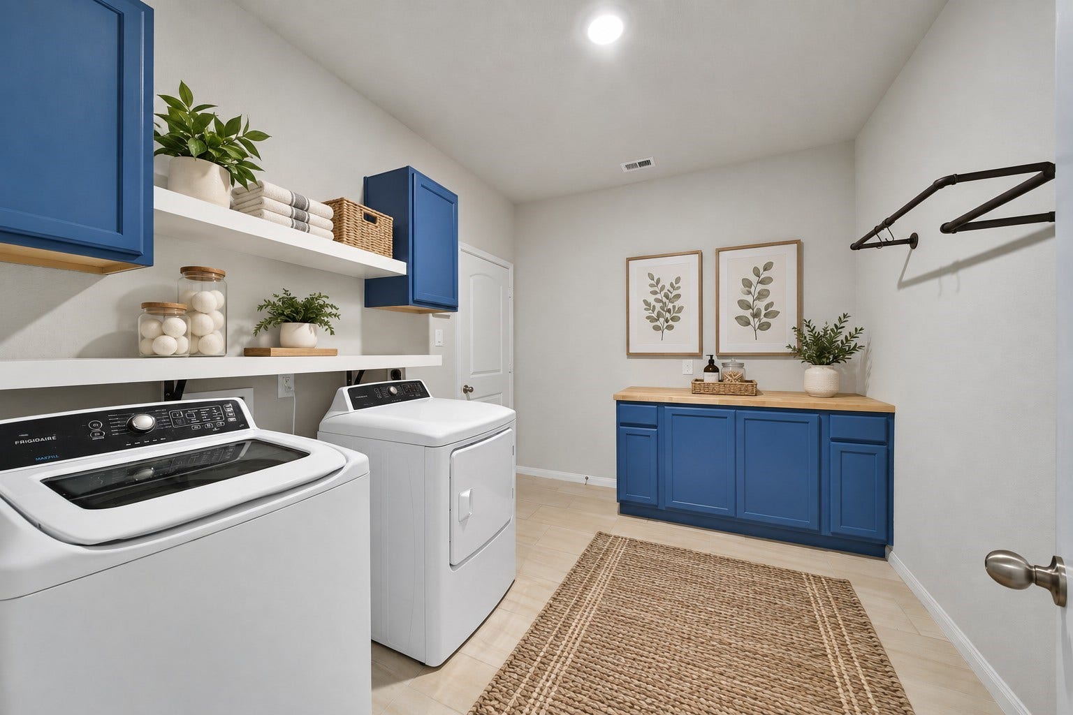 15423 Hopkins Cedar Drive, Humble, TX 77346 Spacious laundry room with folding counter, plenty of storage, and washer and dryer included! (Virtually staged)