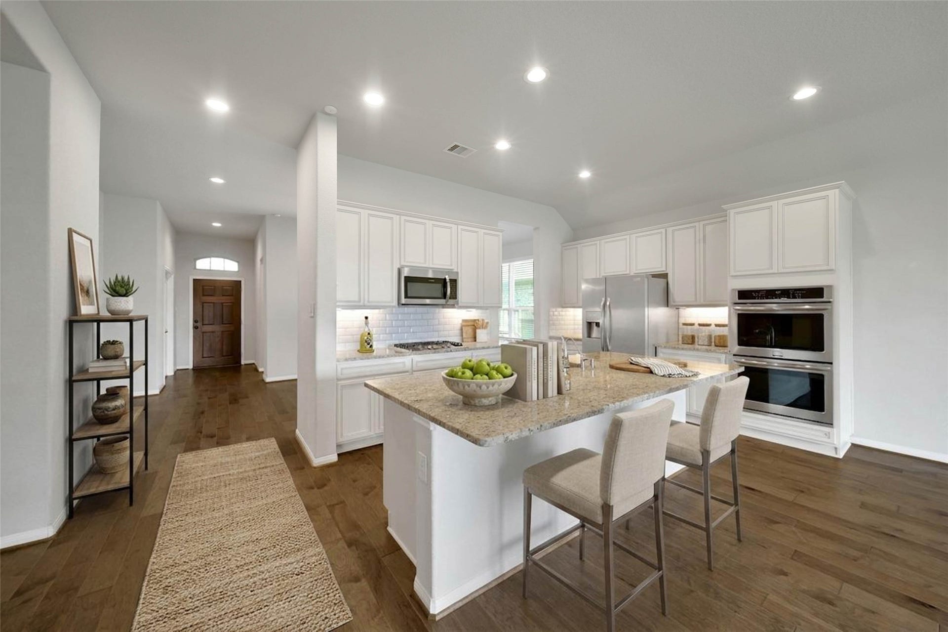 15423 Hopkins Cedar Drive, Humble, TX 77346 Island kitchen with stainless steel appliances - refrigerator is included (virtually staged)