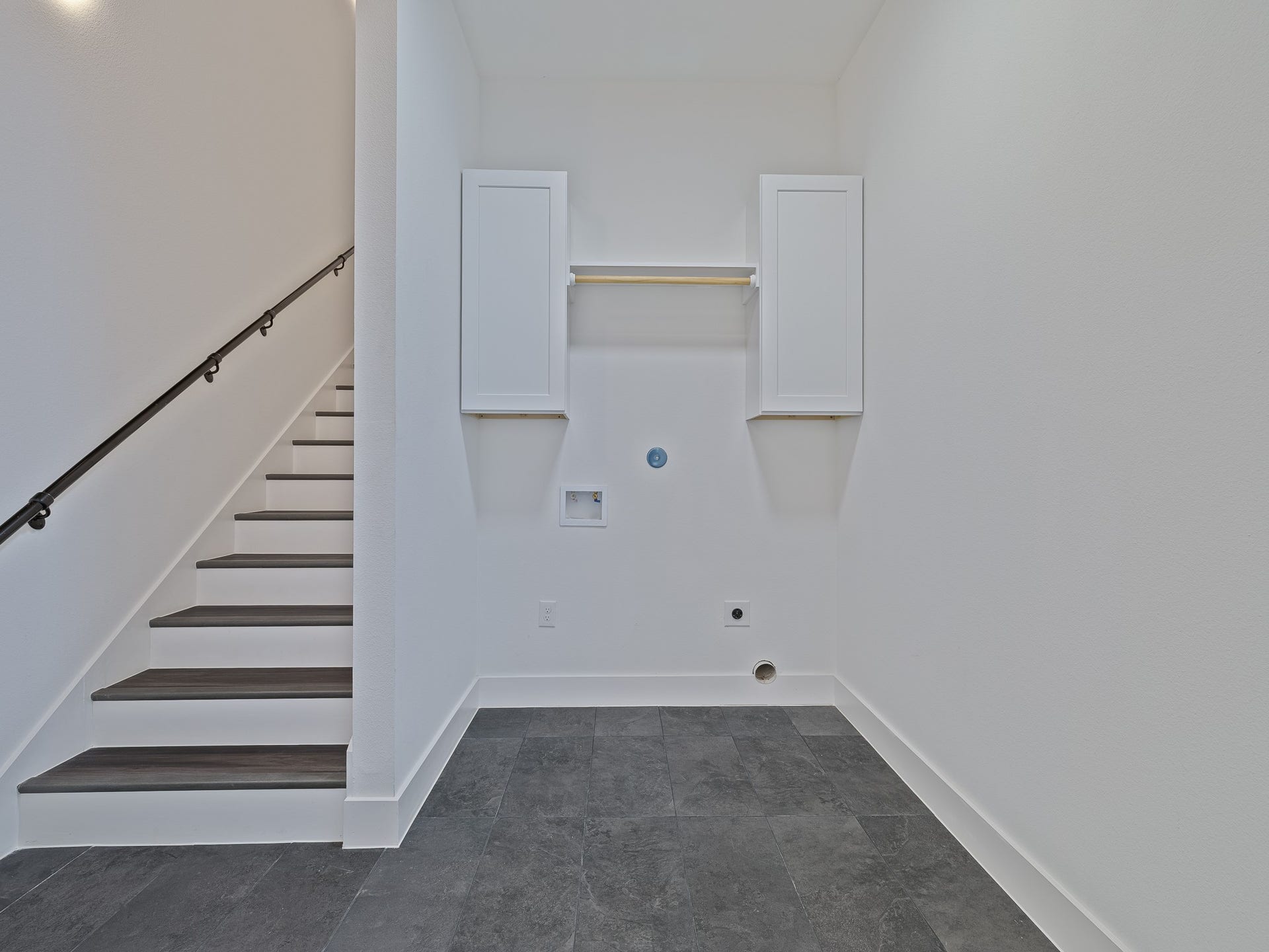 500 Campfire Trail, Angleton, TX 77515 Laundry room with stairs leading up to game room