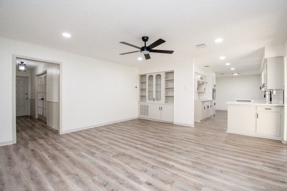 729 Arbor Drive, Deer Park, TX 77536 Open living area with updated flooring and recessed lighting