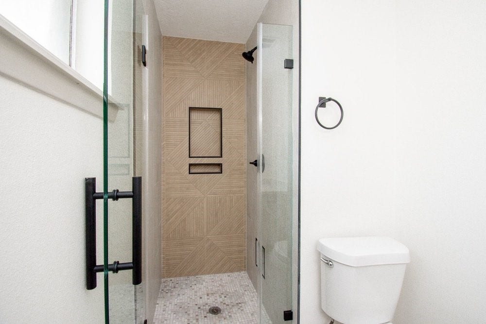 729 Arbor Drive, Deer Park, TX 77536 Updated bathroom featuring a modern walk-in shower