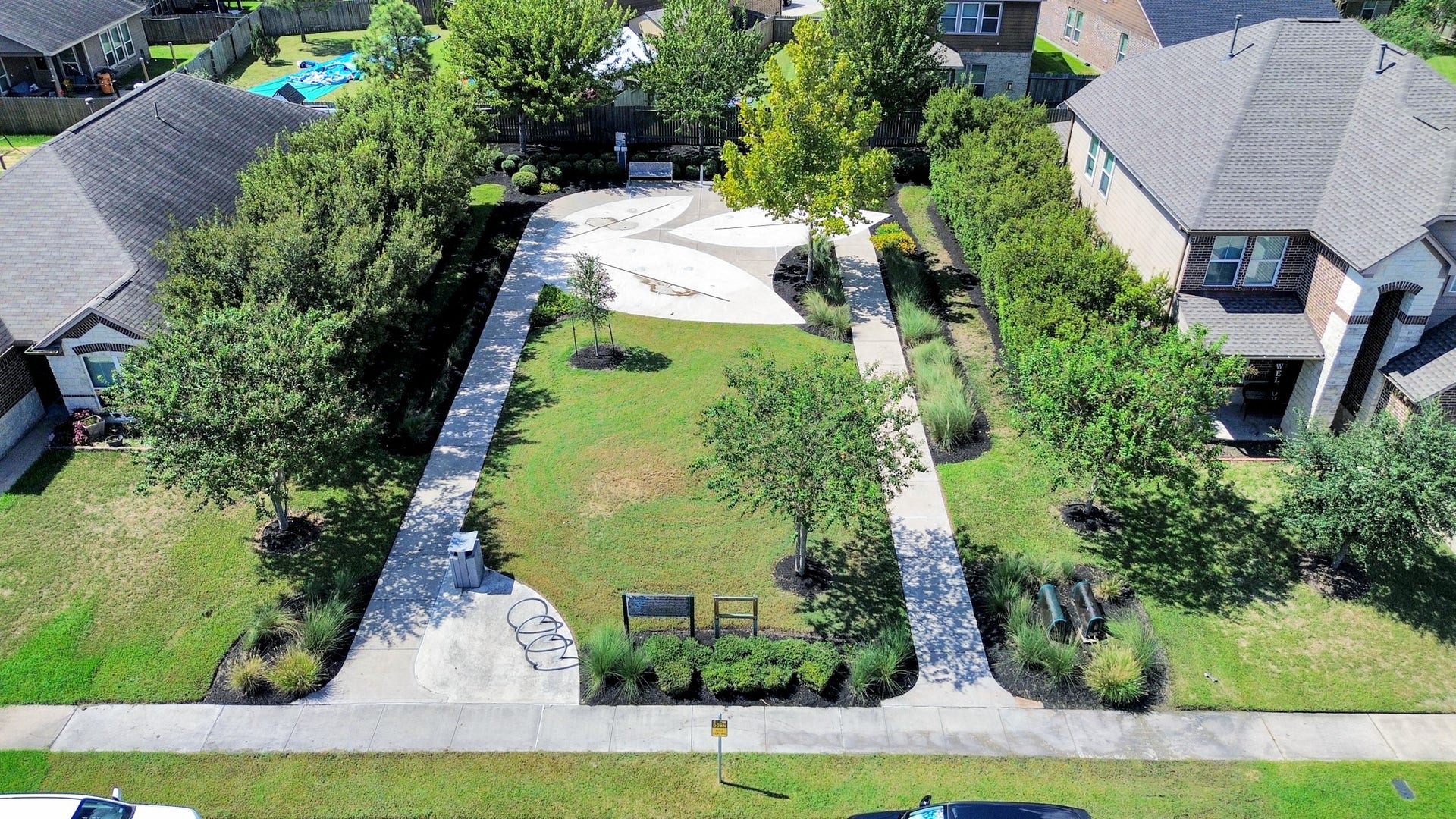Neighborhood splash pad is conveniently located on the same street, offering nearby outdoor fun just moments from home.