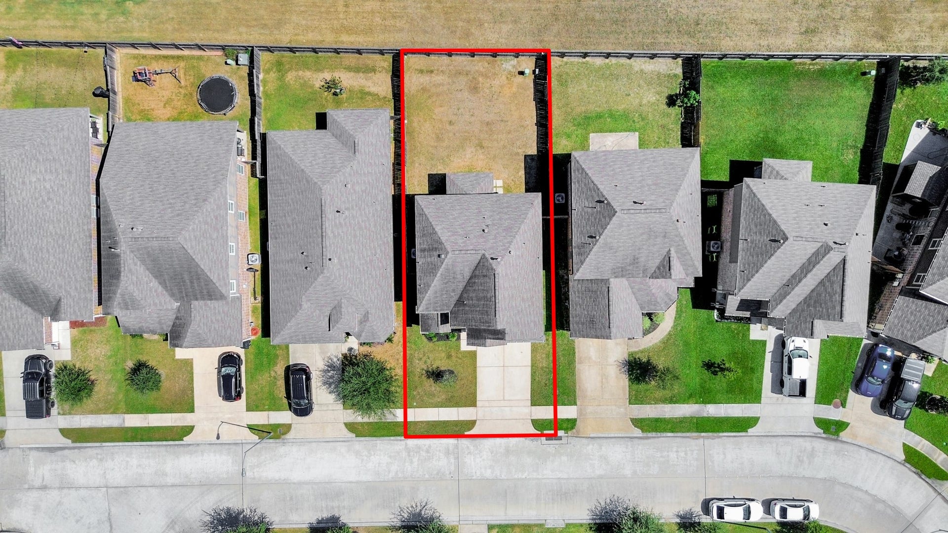 Aerial view highlights the homes full lot, generous backyard, two-car driveway and added privacy with no immediate back neighbors.