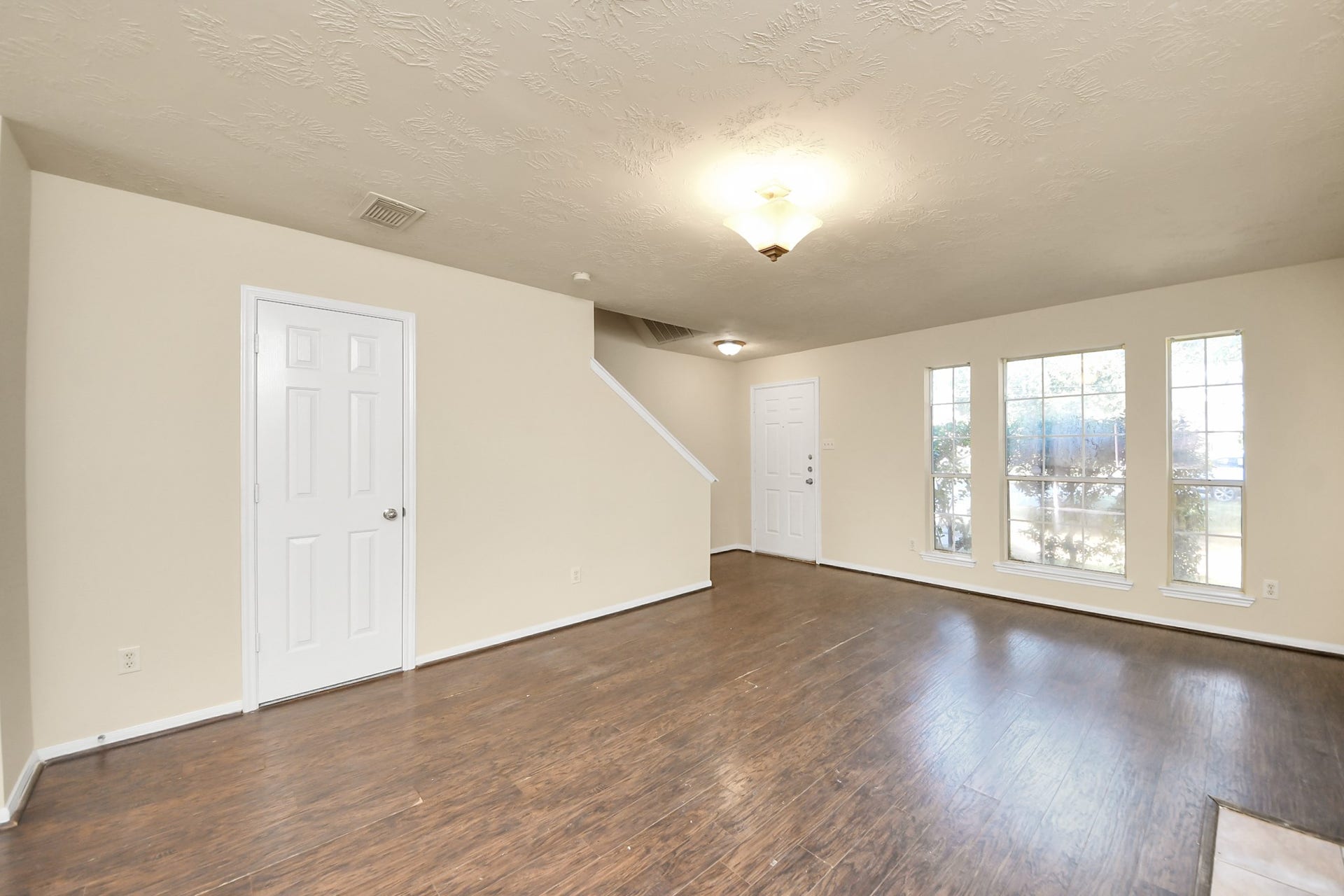 Front door leading to your large living and dining open concept space.