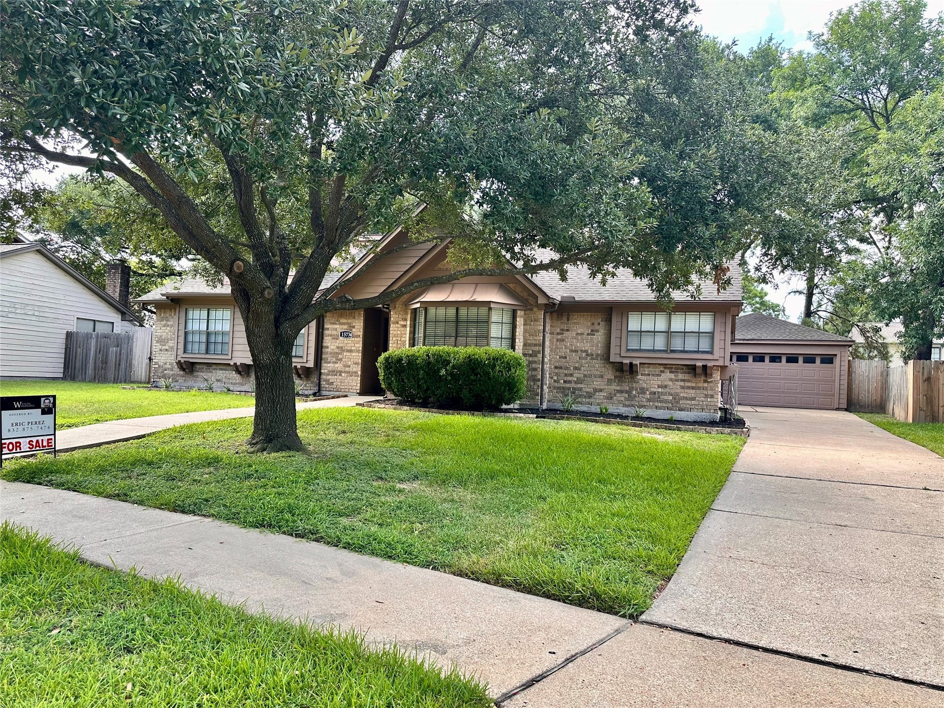 15734 Lakedale Drive, Houston, TX 77095 Front with a detached garage in back.
