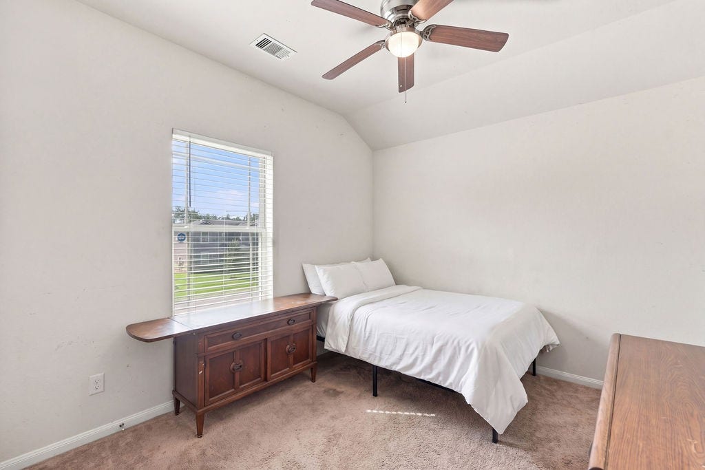 6623 Blimp Base Blvd, Hitchcock, TX 77563 Third bedroom upstairs (virtually staged).