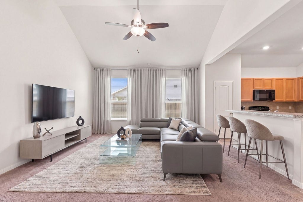 6623 Blimp Base Blvd, Hitchcock, TX 77563 A virtually staged look of the living area and the potential to make it your own.