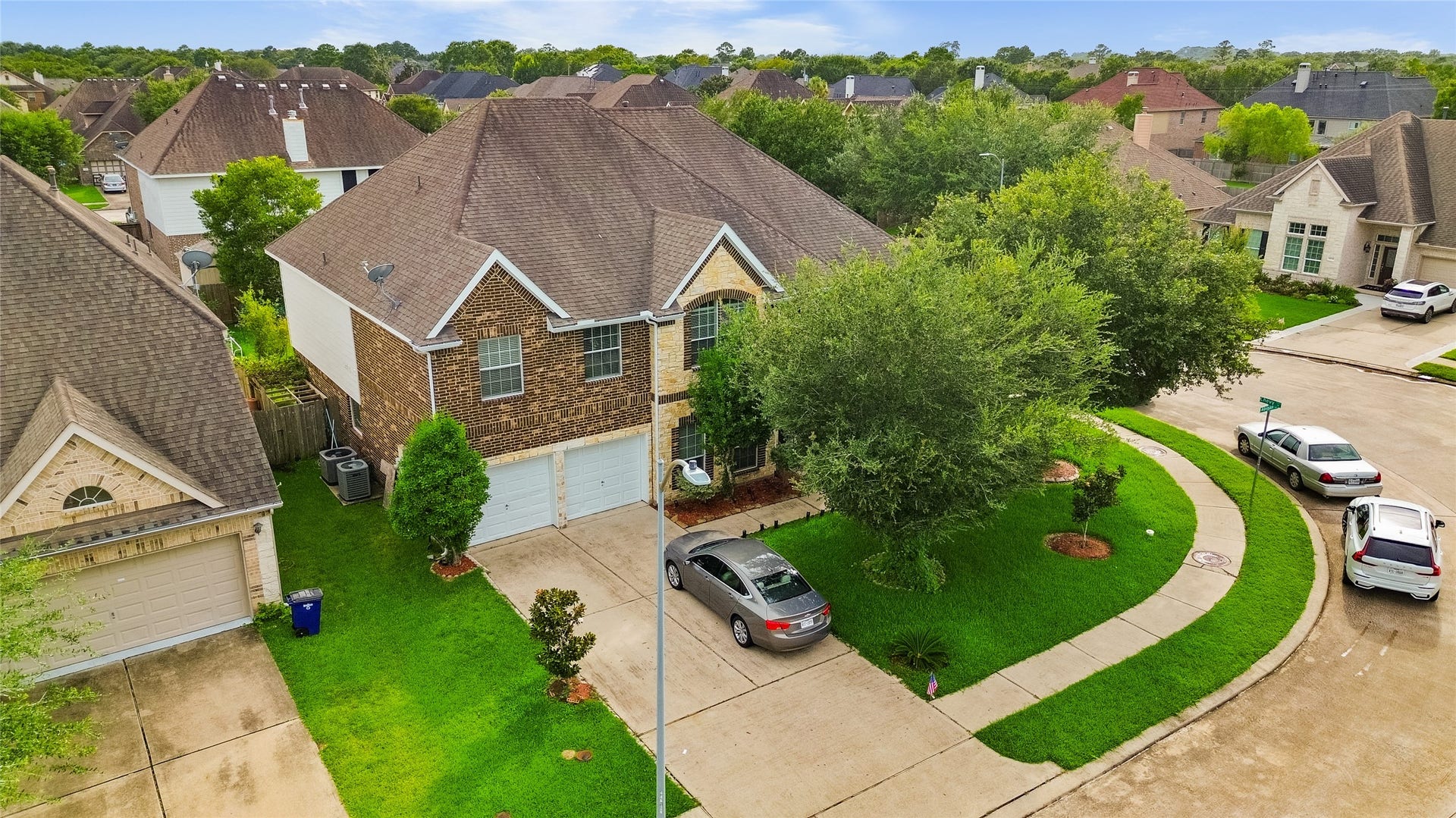 1231 Abigail Lane, Friendswood, TX 77546 Pulling into the driveway each day, you're welcomed by lush landscaping and a home that stands out on its spacious lot.