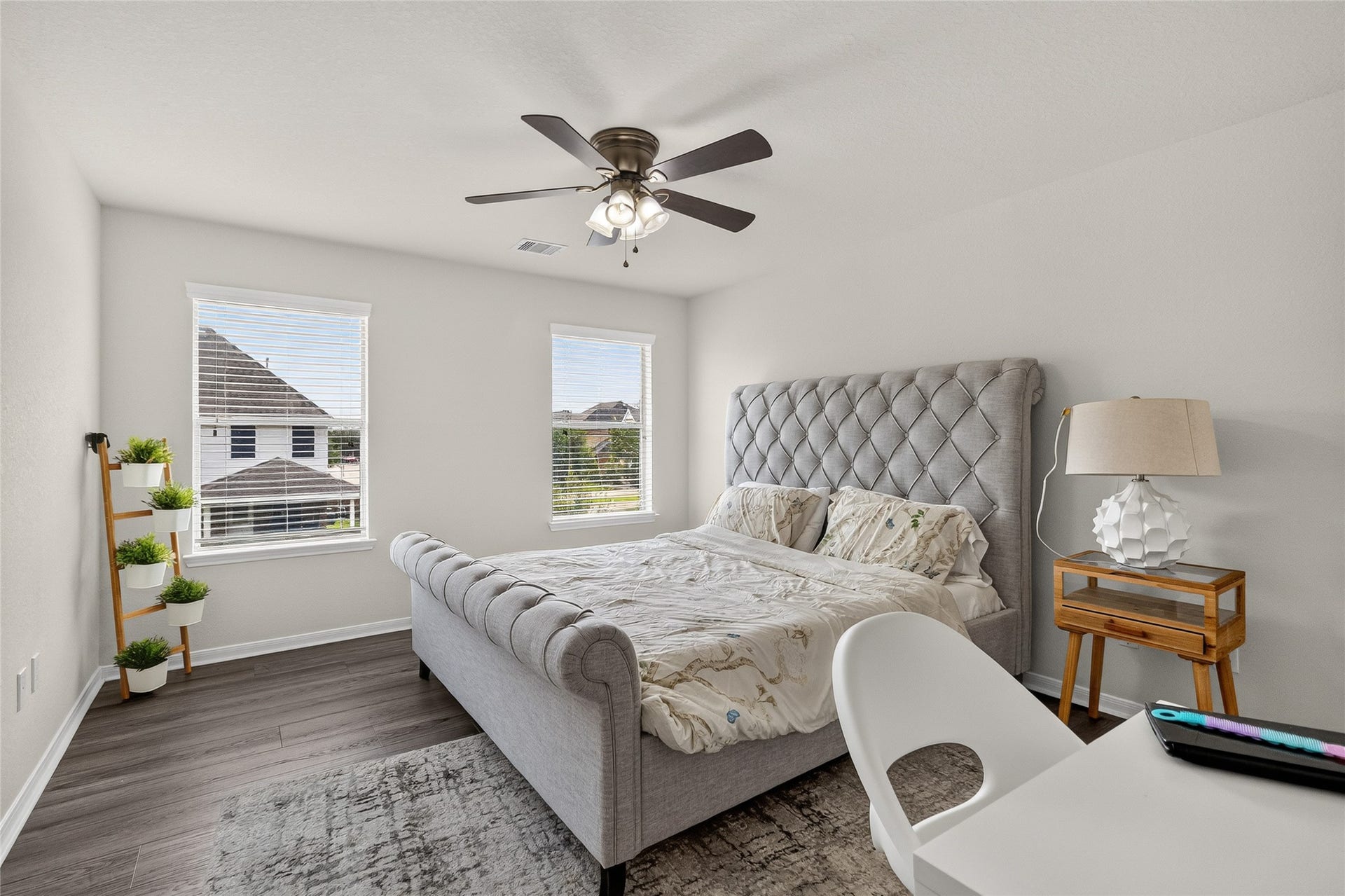 1231 Abigail Lane, Friendswood, TX 77546 Everyone enjoys their own space in this well-sized secondary bedroom, offering a bright atmosphere and plenty of room to make it your own.