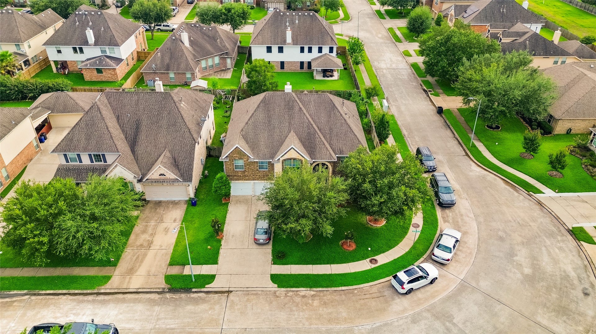 1231 Abigail Lane, Friendswood, TX 77546 Coming home feels even better with a corner lot that offers extra space, mature trees, and beautiful curb appeal.