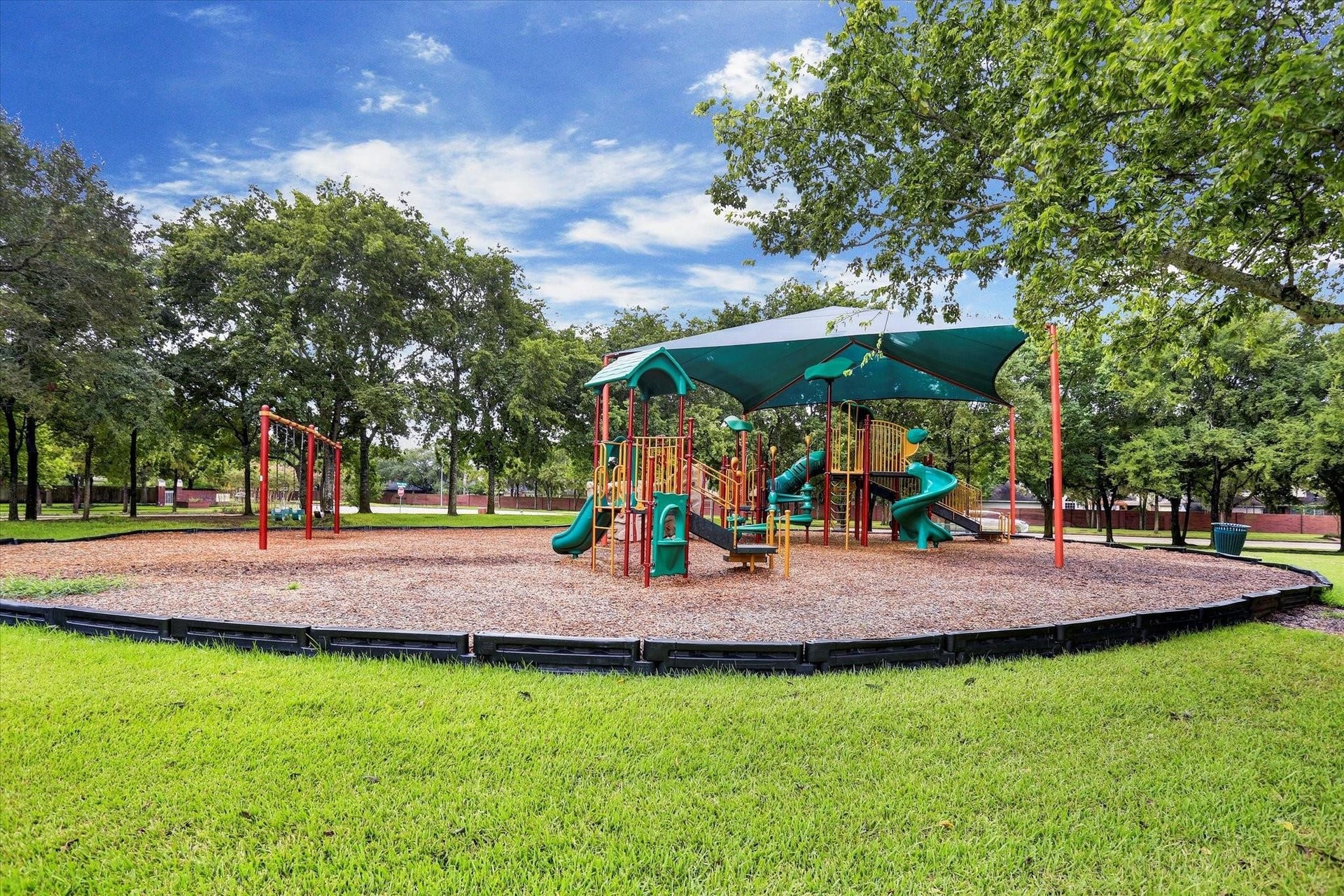 7806 Silent Forest Drive, Sugar Land, TX 77479 One of many playgrounds.
