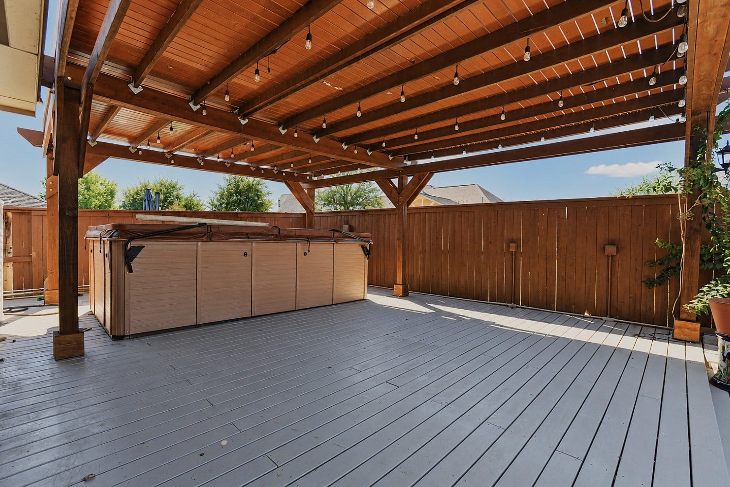 218 Bentwater Lane, Clute, TX 77531 Covered deck patio swim hot tub.