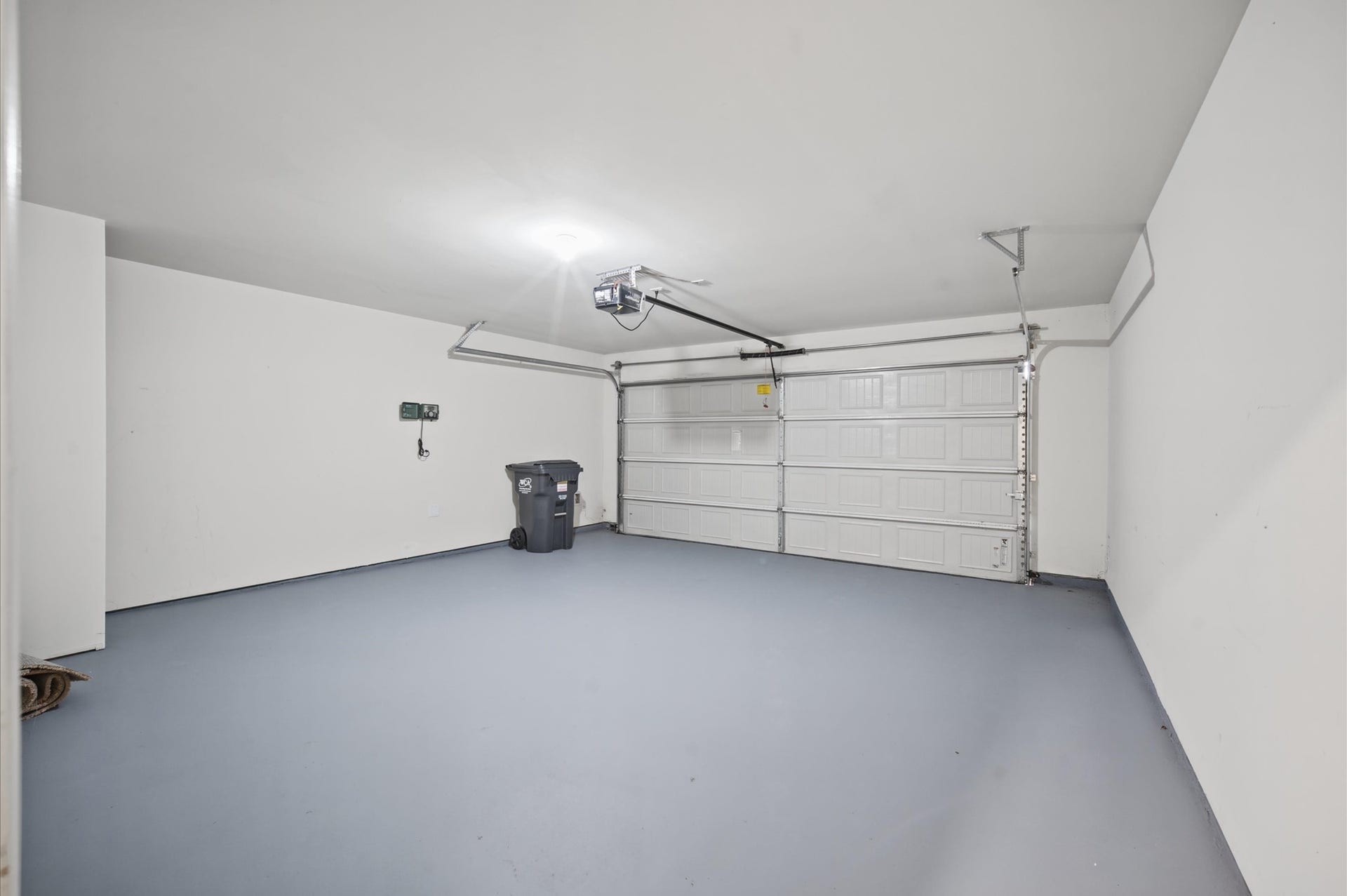 327 Spanish Stone Drive, Katy, TX 77493 Freshly painted garage floor and walls. Garage door opener inlcuded.