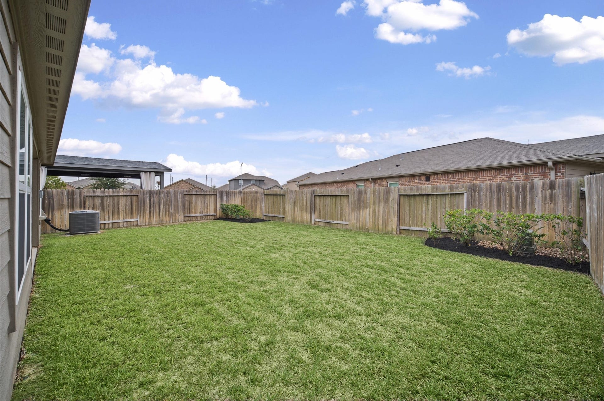 327 Spanish Stone Drive, Katy, TX 77493 Large backyard with easy maintenance.