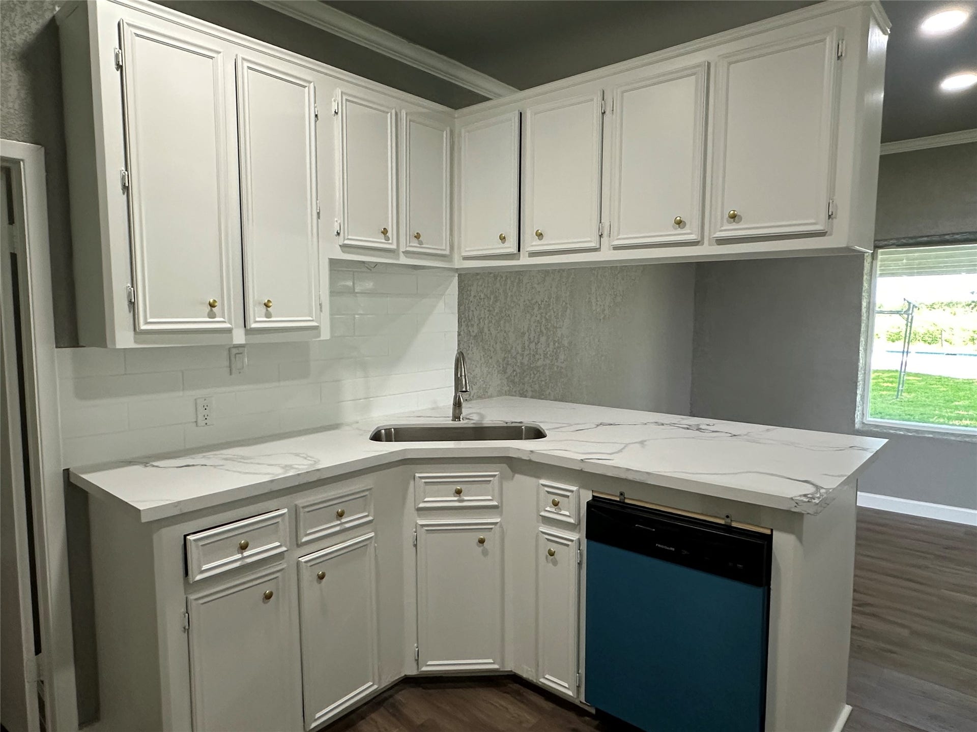 40344 Harpers Church Road, Hempstead, TX 77445 View of the sink and dishwasher overlooking the dining area
