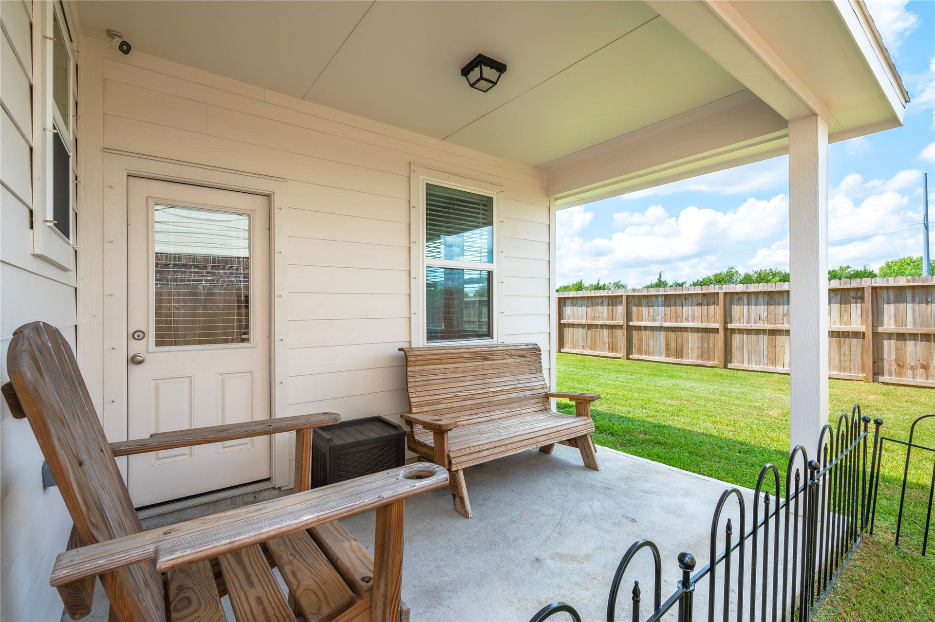 1849 Kenley Way, Alvin, TX 77511 Charming covered patio perfect for relaxing and enjoying the view of the spacious fenced backyard. New fence was installed last year.