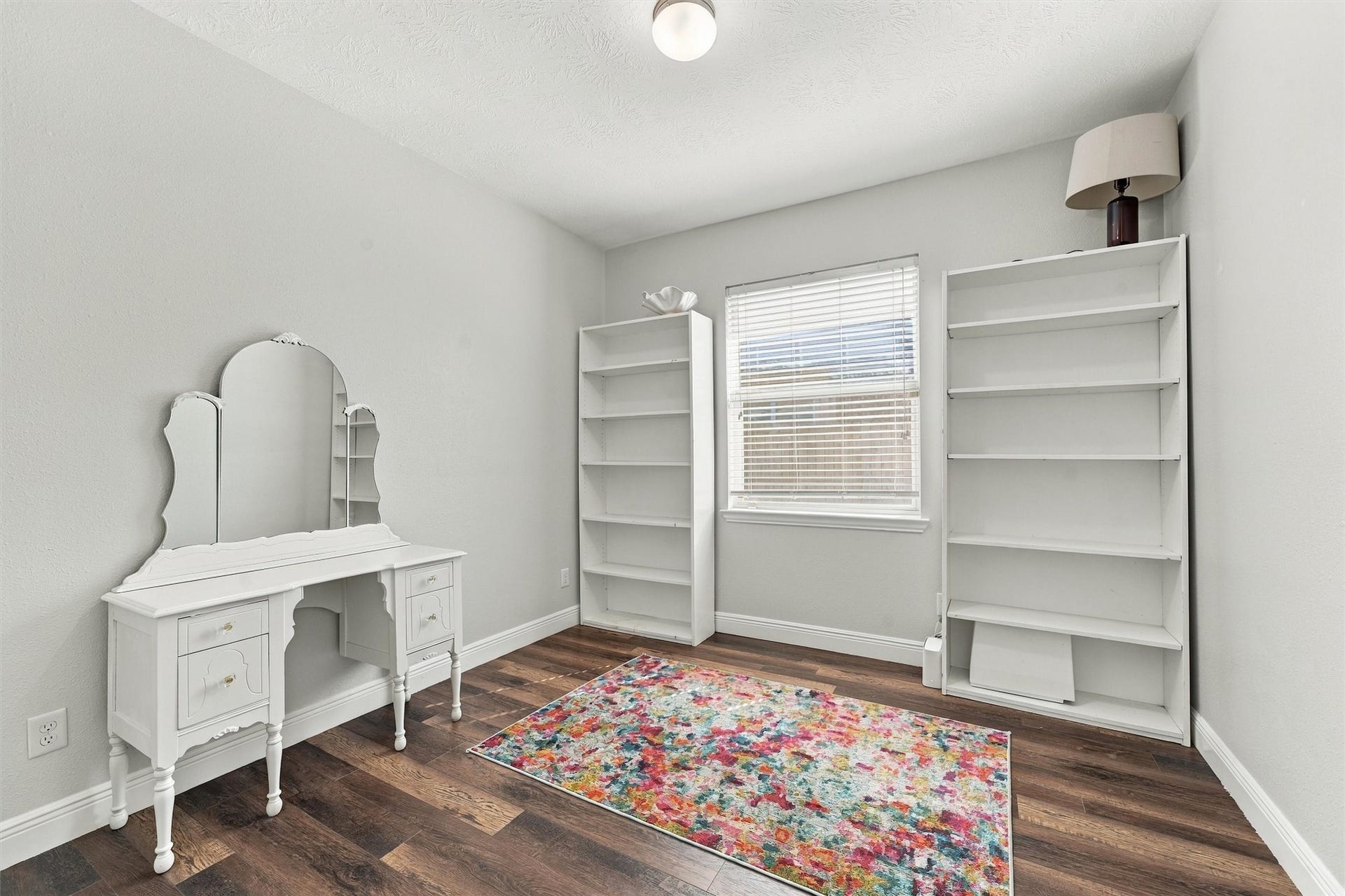 Flexible office or game room with french doors.
