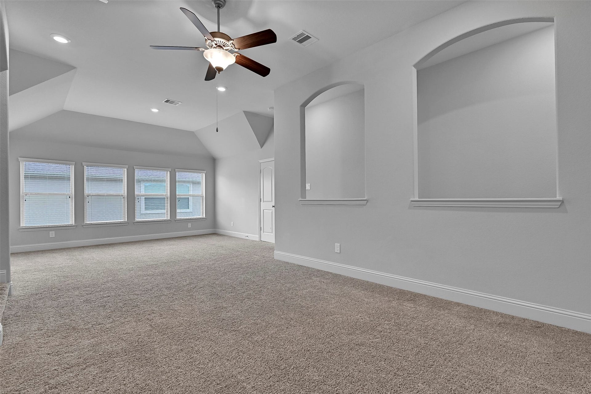 One of the most unique features of this Village Builders design is the dedicated second level, where a sprawling game room creates the ultimate retreat. With all four bedrooms located downstairs, the upper level is reserved for recreation and includes a game room, media room, and full bath.