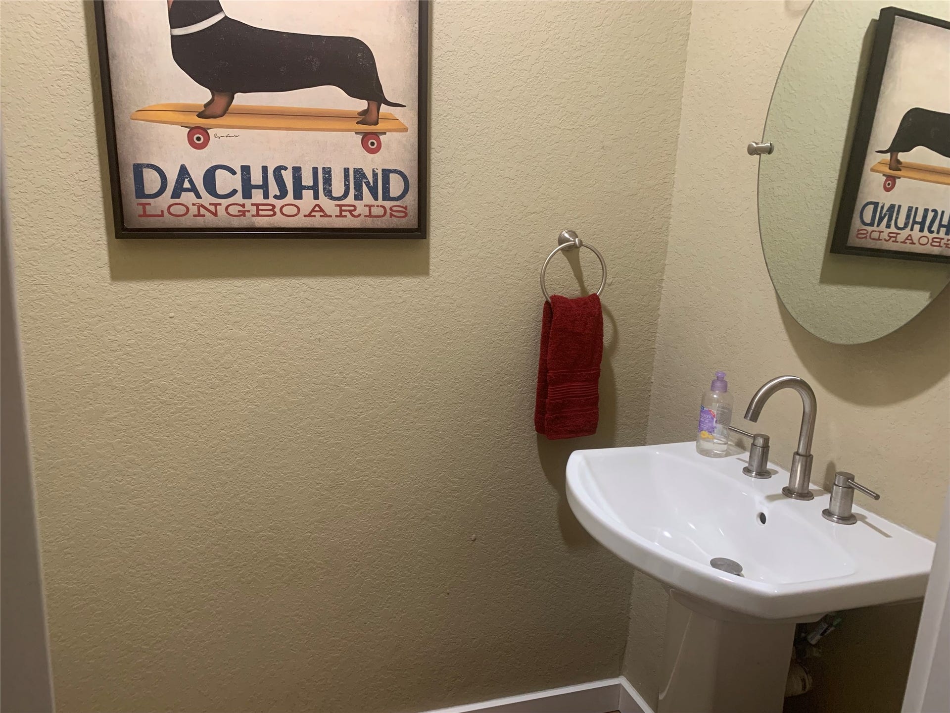 7834 County Road 255, Damon, TX 77430 Powder room with pedestal sink.