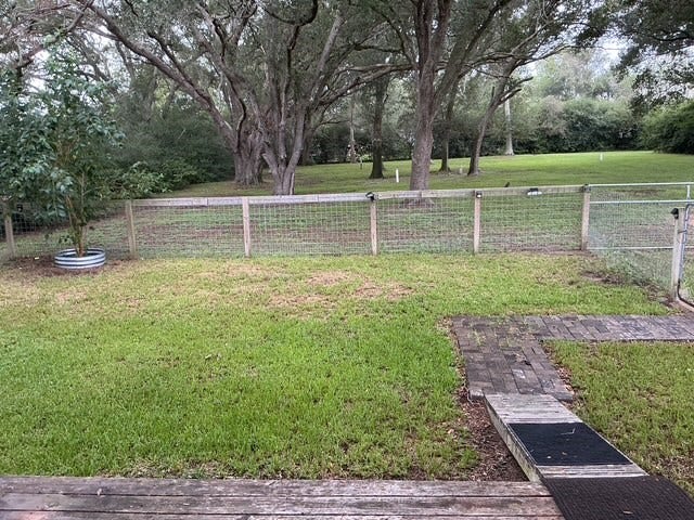 7834 County Road 255, Damon, TX 77430 One section of the acreage is fenced for your pets.