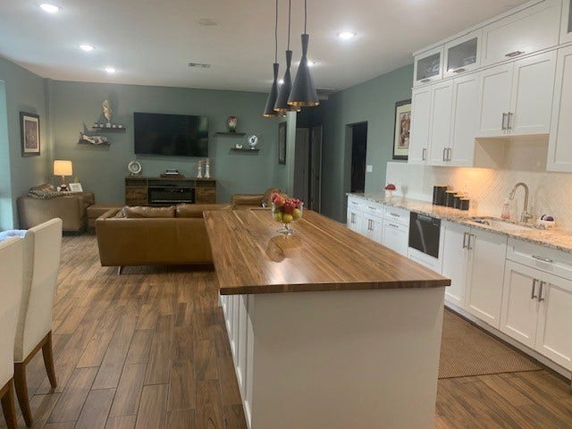 7834 County Road 255, Damon, TX 77430 View of the kitchen to the family room.