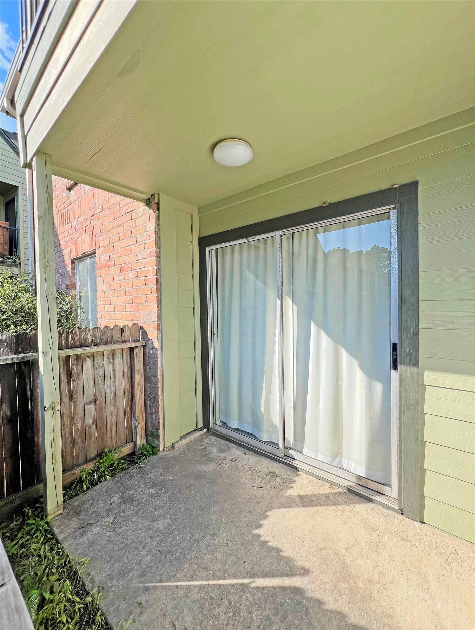 18800 Egret Bay Boulevard, #1201, Webster, TX 77058 Storage door and fence are in the process of being repaired.
