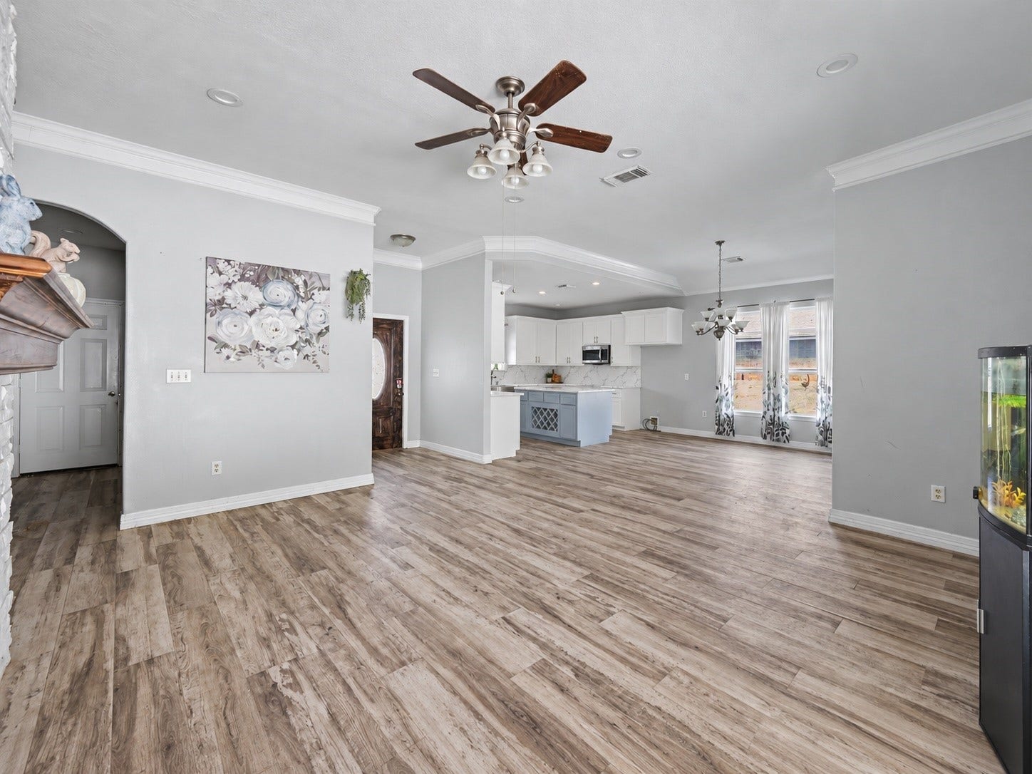 Expansive open-concept living and dining area with a seamless connection to the kitchen- great for entertaining