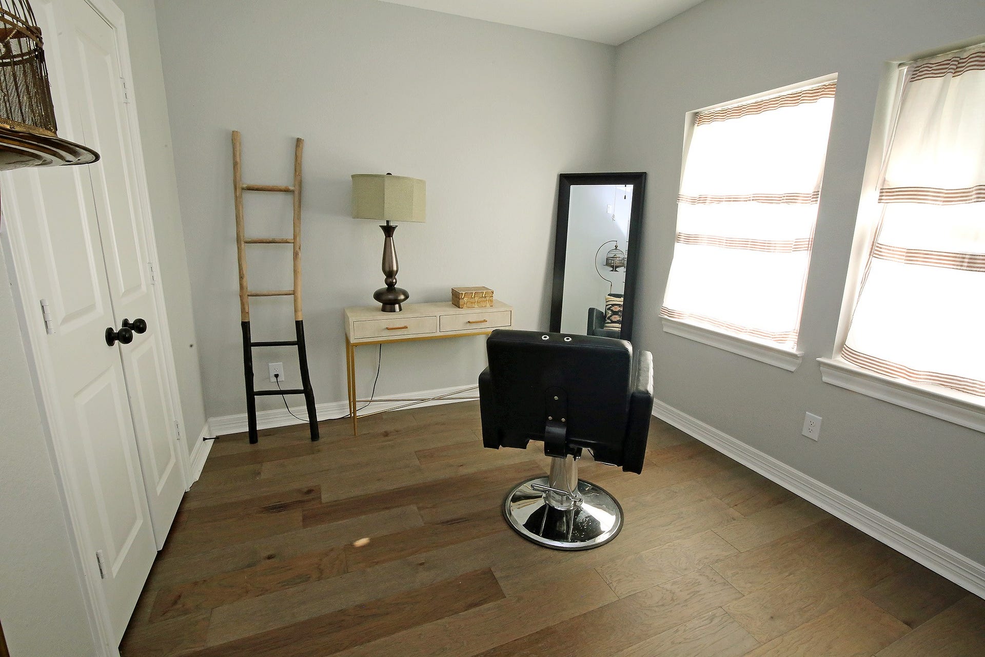 7101 2nd Street, Hitchcock, TX 77563 Bedroom #1 with natural lighting from the windows.