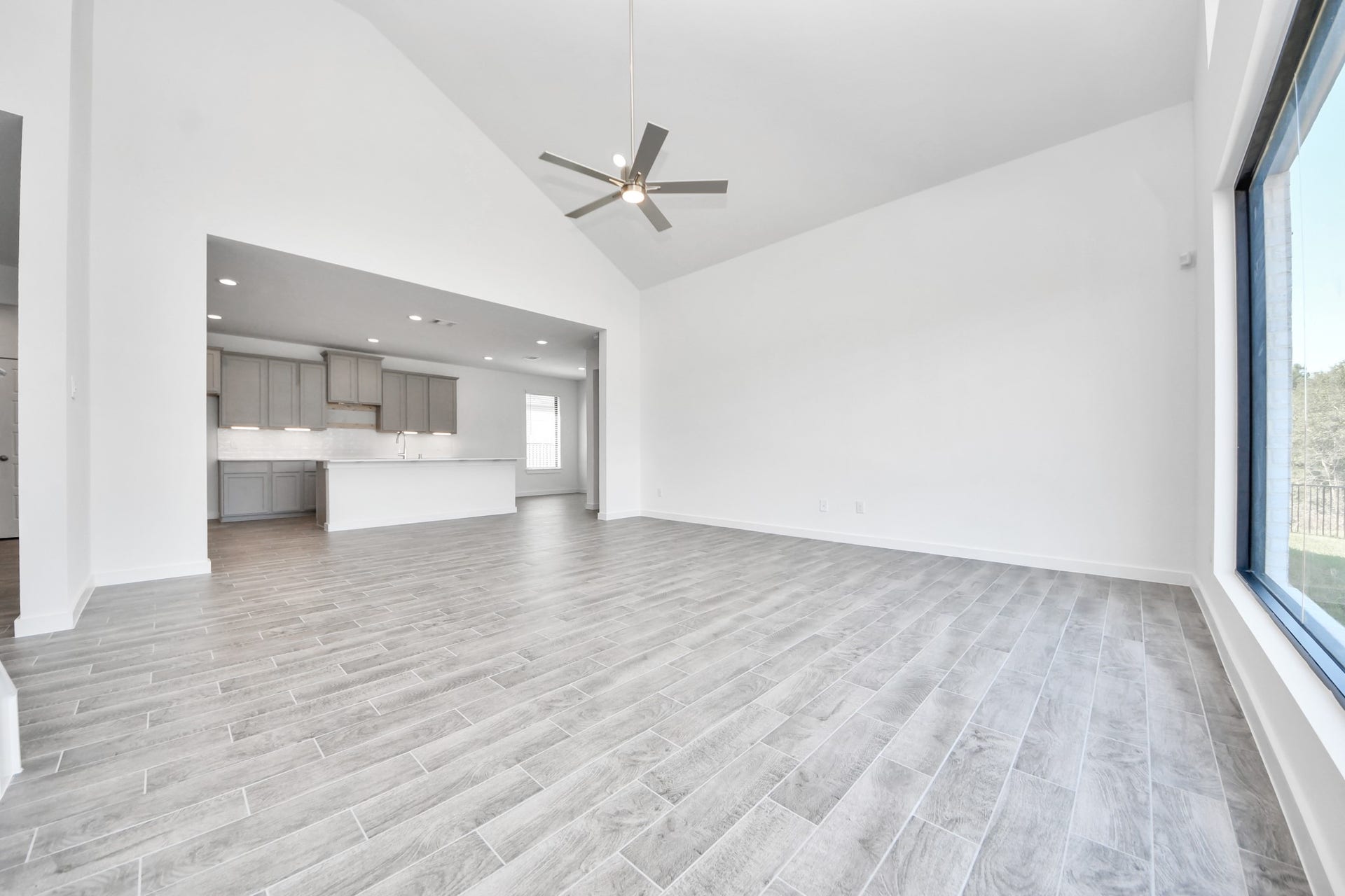 Take another glimpse into the heart of the home with this additional view of the family rooma sprawling space ready to accommodate all your gatherings.