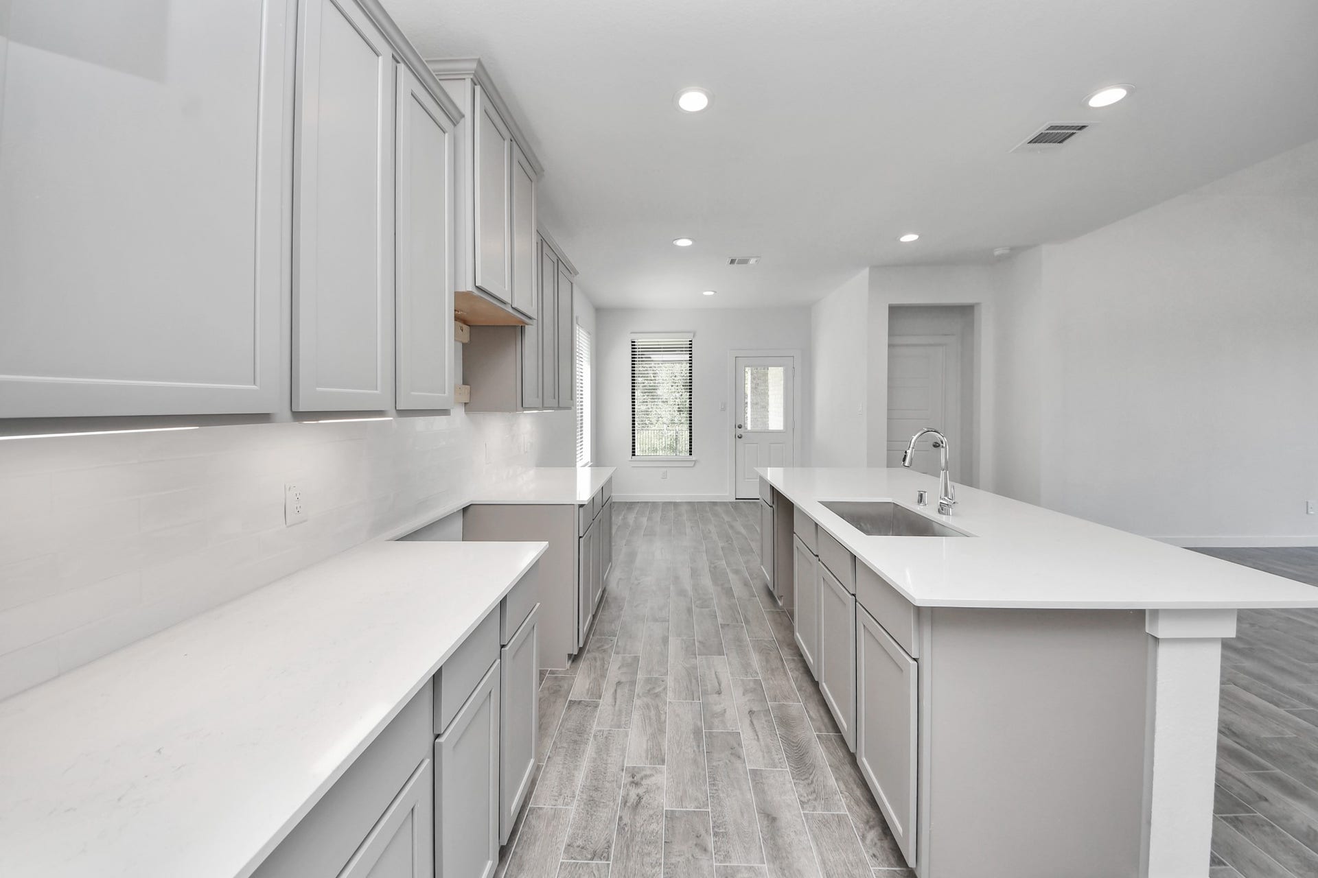 The extended counter area adds both practicality and style, making meal preparation a breeze. Every detail is thoughtfully designed to enhance the kitchen's functionality and aesthetic appeal.