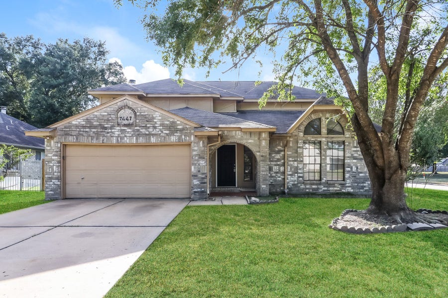 Property photo for 7447 Woodland West Drive, Houston, TX