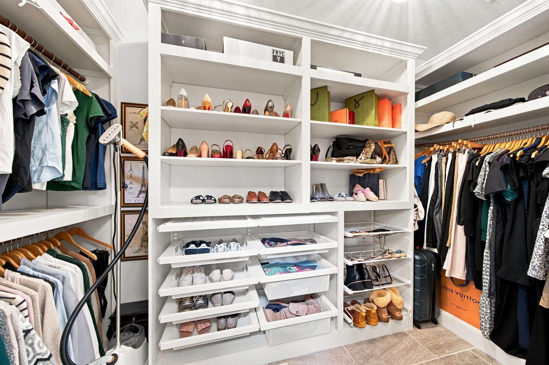 23 S Brokenfern Drive Drive, The Woodlands, TX 77380 Spacious custom-built walk-in closet with organized shelving and storage