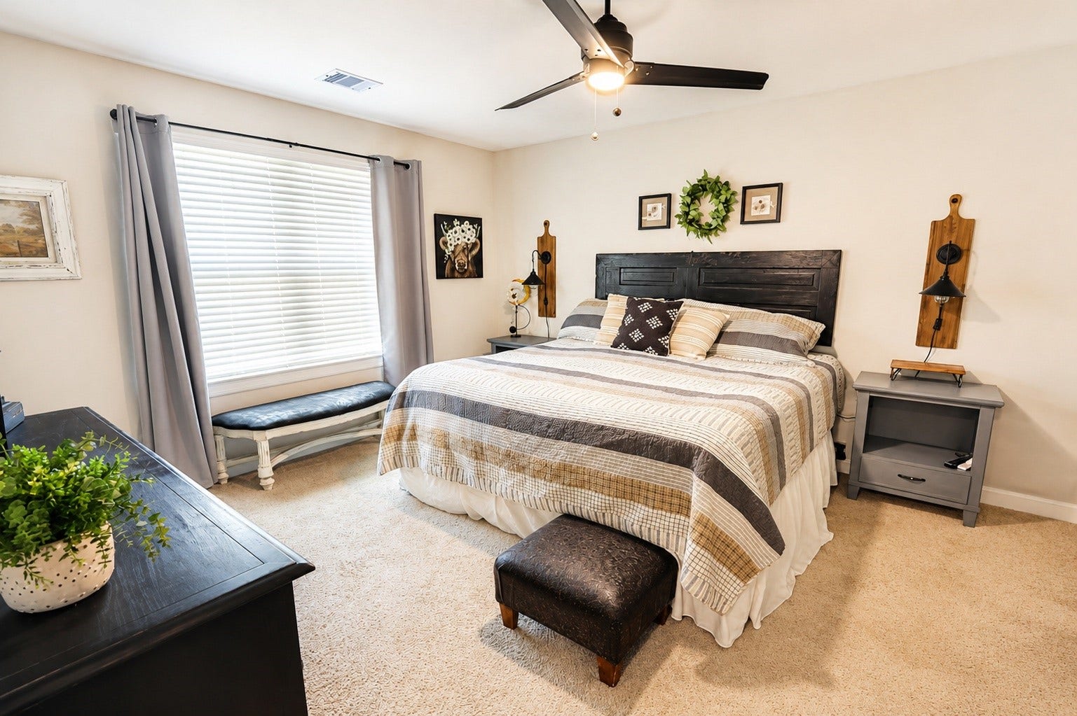837 Dawn Redwood Court, Conroe, TX 77304 Primary bedroom with large king size bed with an abundance of natural lightening.