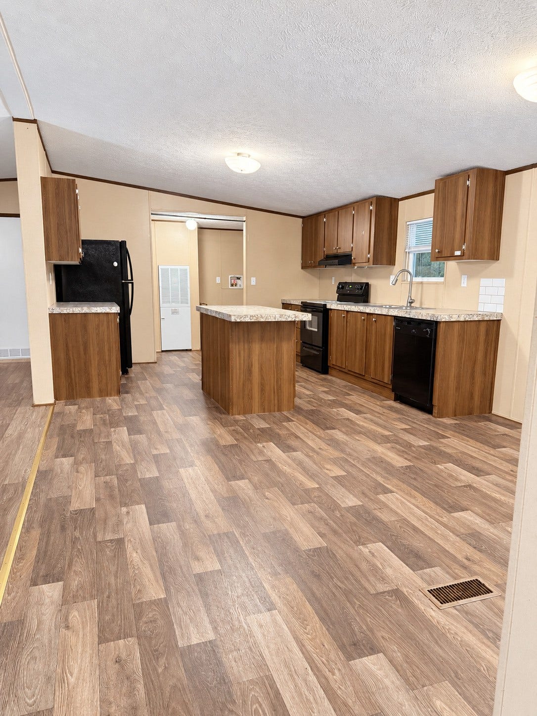 21144 Live Oak Street, New Caney, TX 77357 View of Kitchen and Utility Room from Dining Area