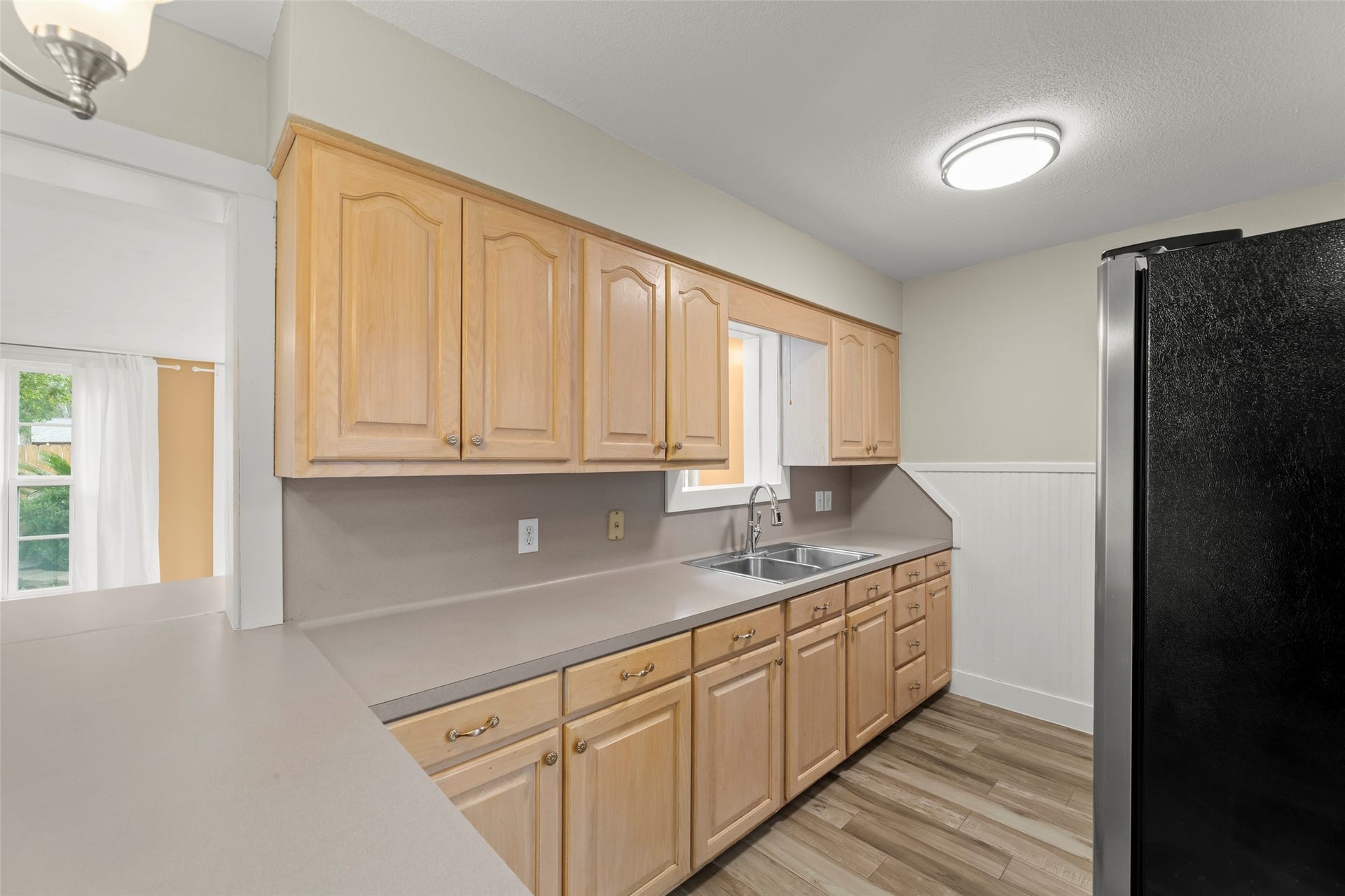 3419 Beasley Avenue, Needville, TX 77461 Galley kitchen. Fridge conveys.