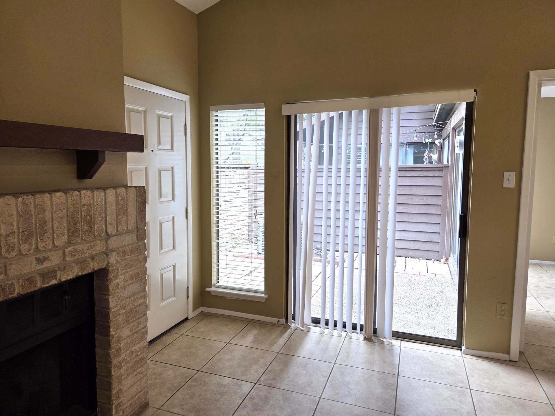 Open Sliding doors to private patio.