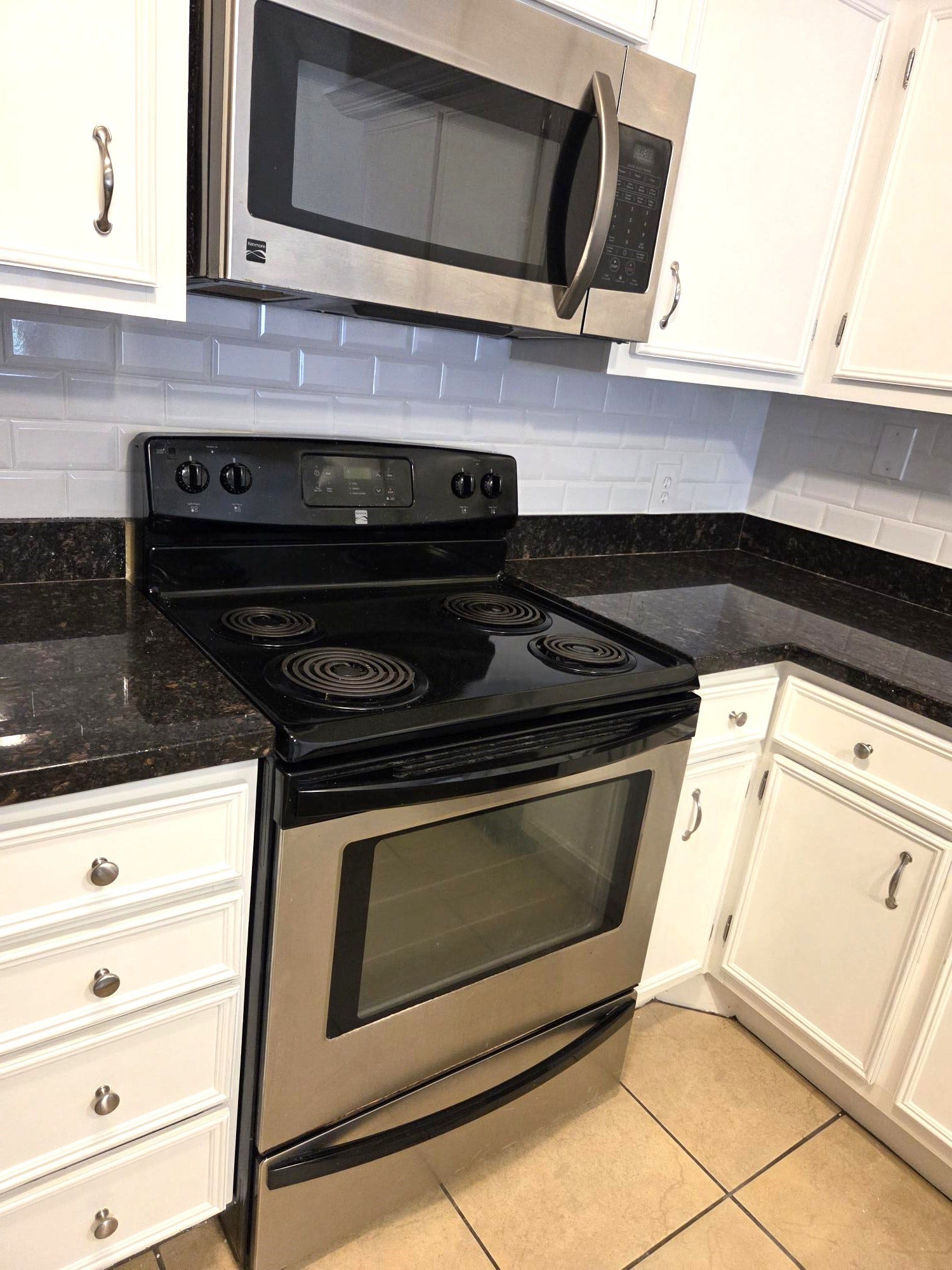 Kitchen Microwave and Stove.