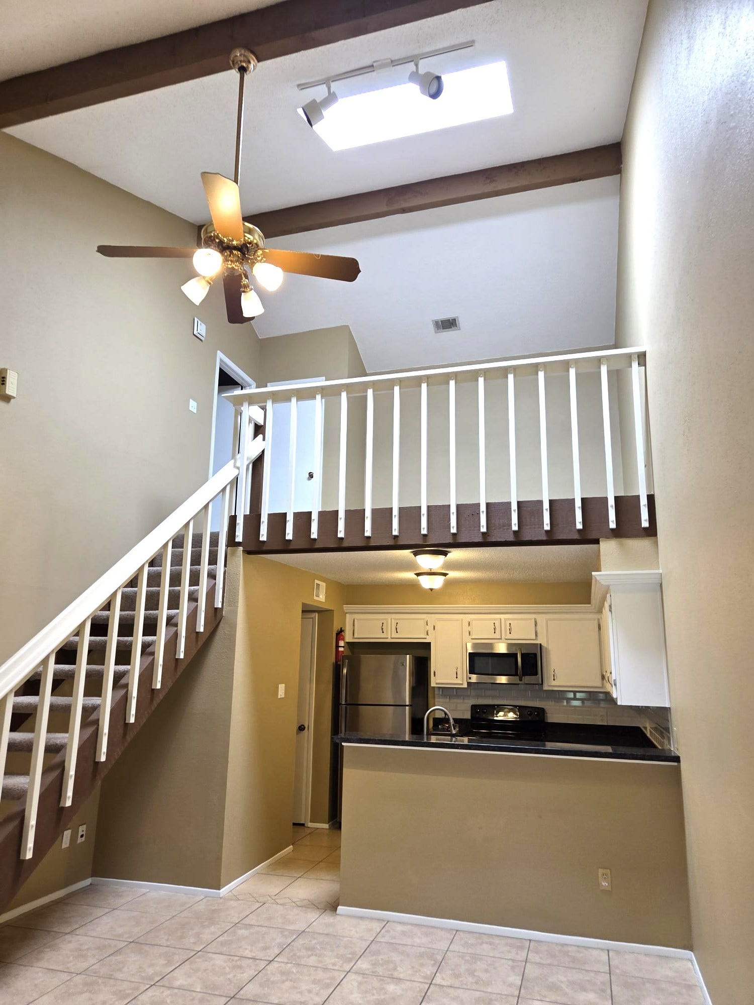 High Ceiling, Loft, dining area and Kitchen views.