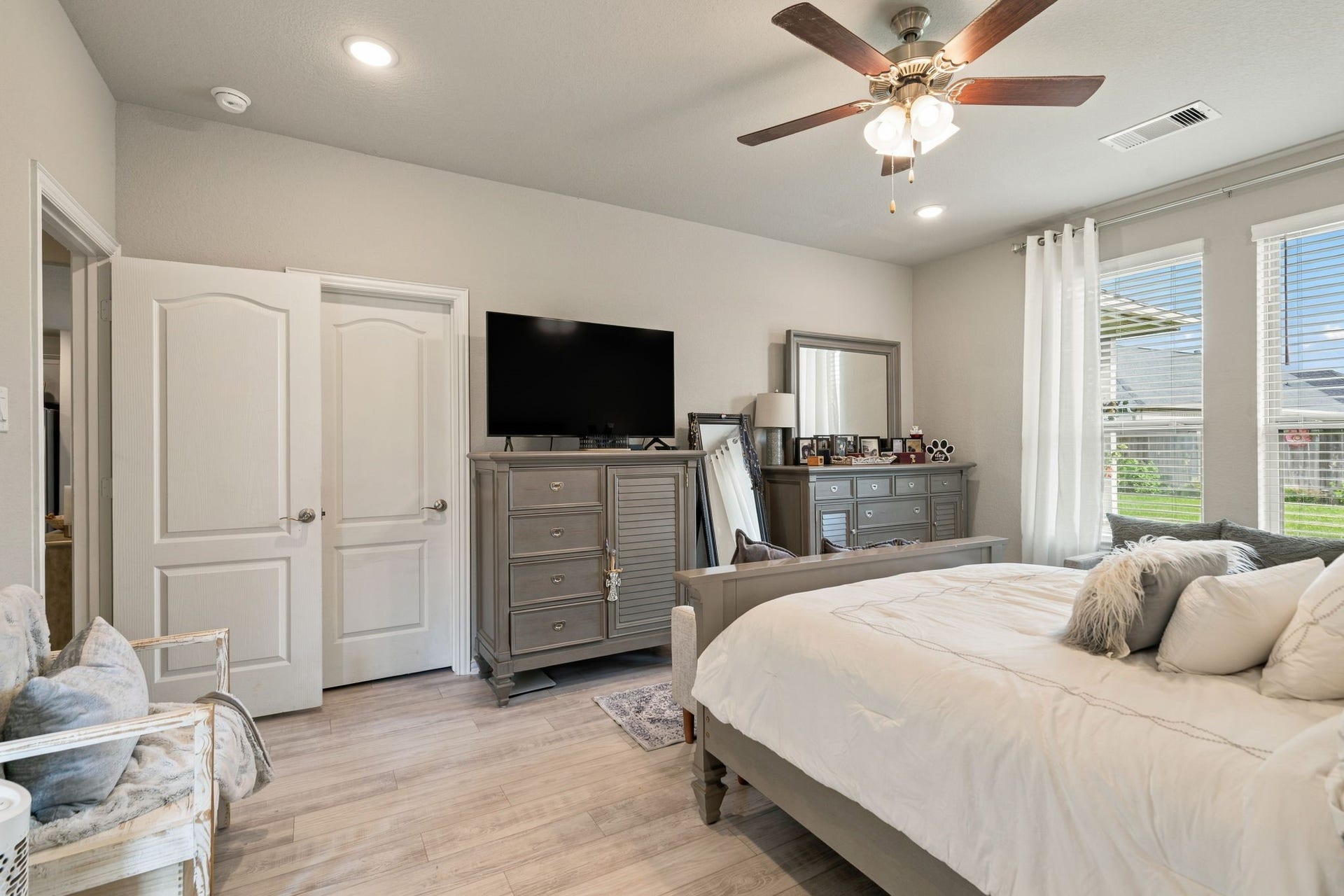 31410 Whitfield Court, Fulshear, TX 77441 Spacious bedroom featuring soft neutral tones, abundant natural light.