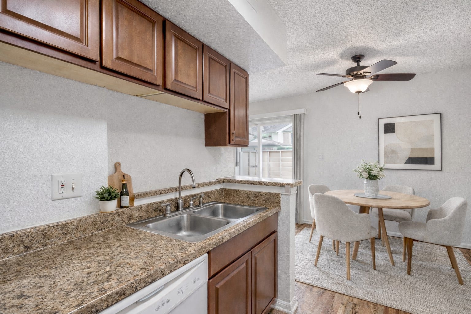 250 El Dorado Boulevard, #283, Houston, TX 77598 The cozy breakfast area, located just off the kitchen, is filled with natural light from windows adorned with privacy blinds and a ceiling fan, making it the perfect spot to enjoy your morning coffee or casual meals. *virtually staged
