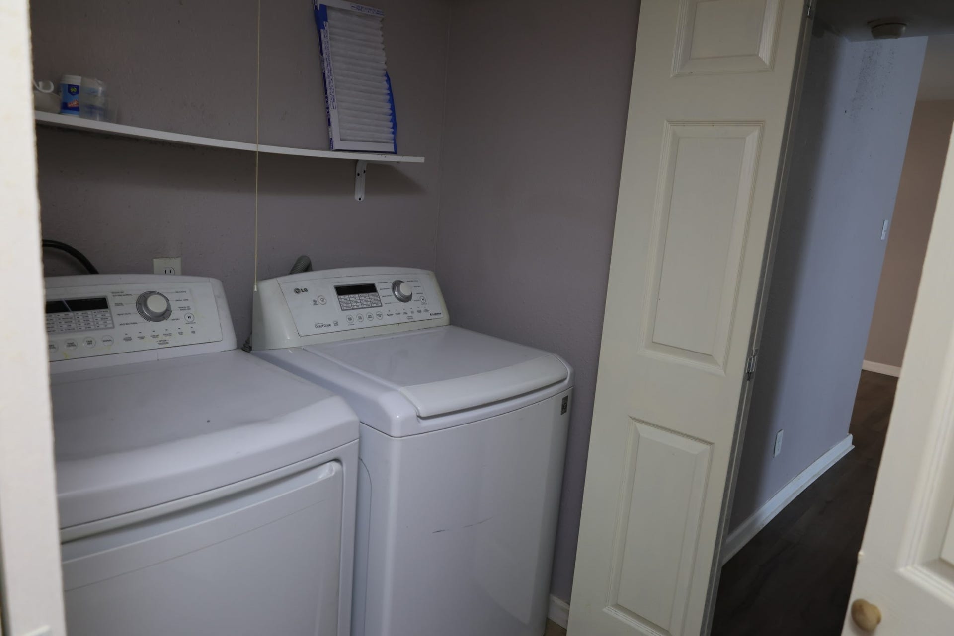5625 Antoine Drive, #1314, Houston, TX 77091 The in-unit laundry closet with overhead shelving.