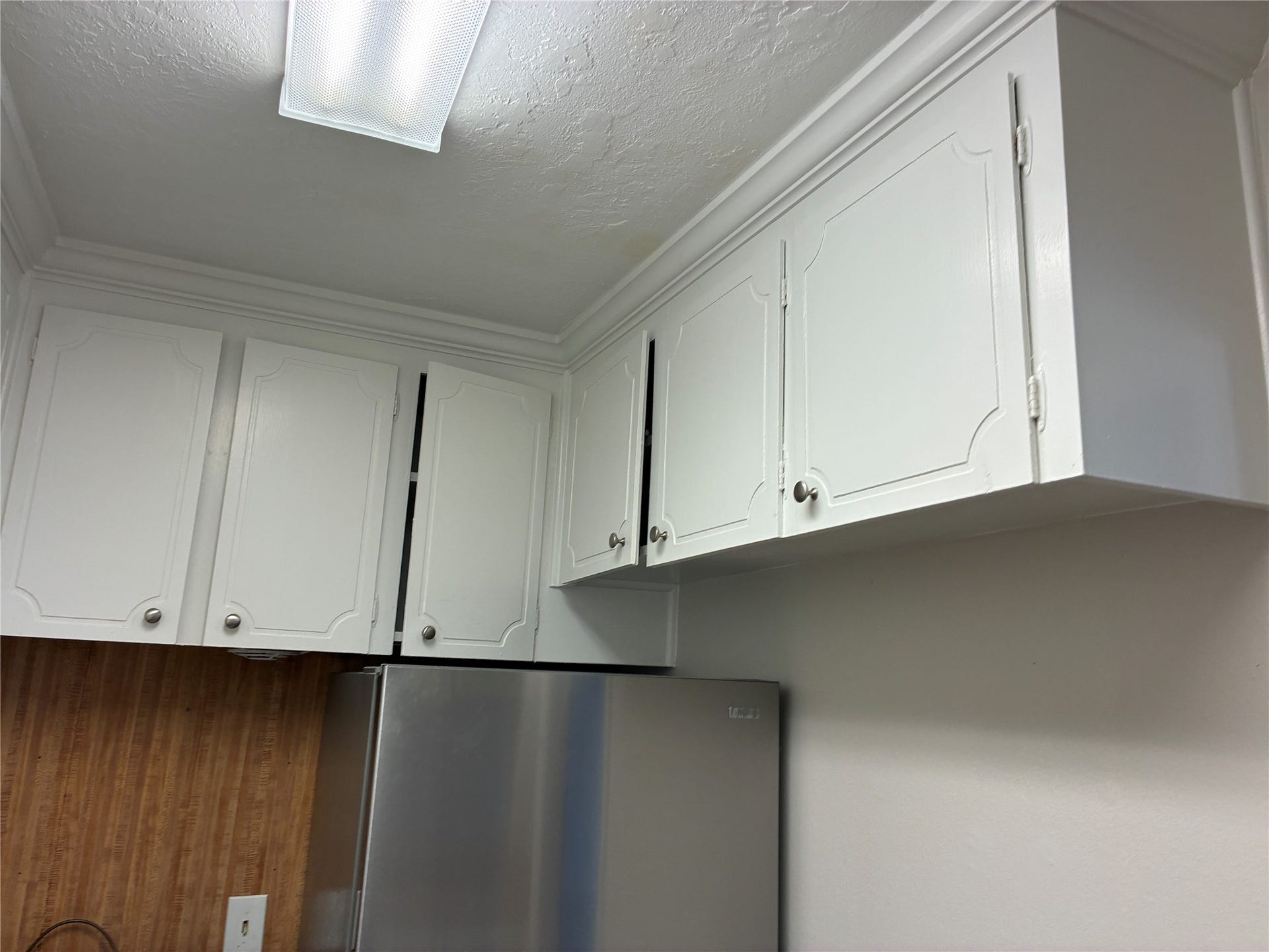 3400 Timmons Lane, #72, Houston, TX 77027 Lots of cabinets in kitchen