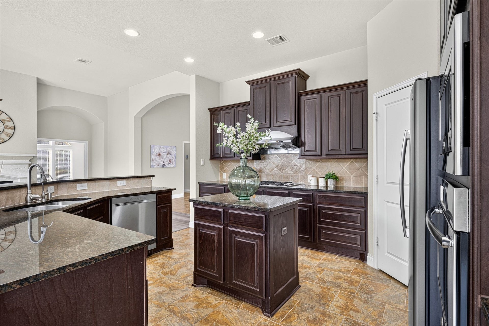 4003 Birch Vale Lane, Sugar Land, TX 77479 The heart of the home! A chef's kitchen designed for baking weekend treats and preparing delicious everyday meals together.