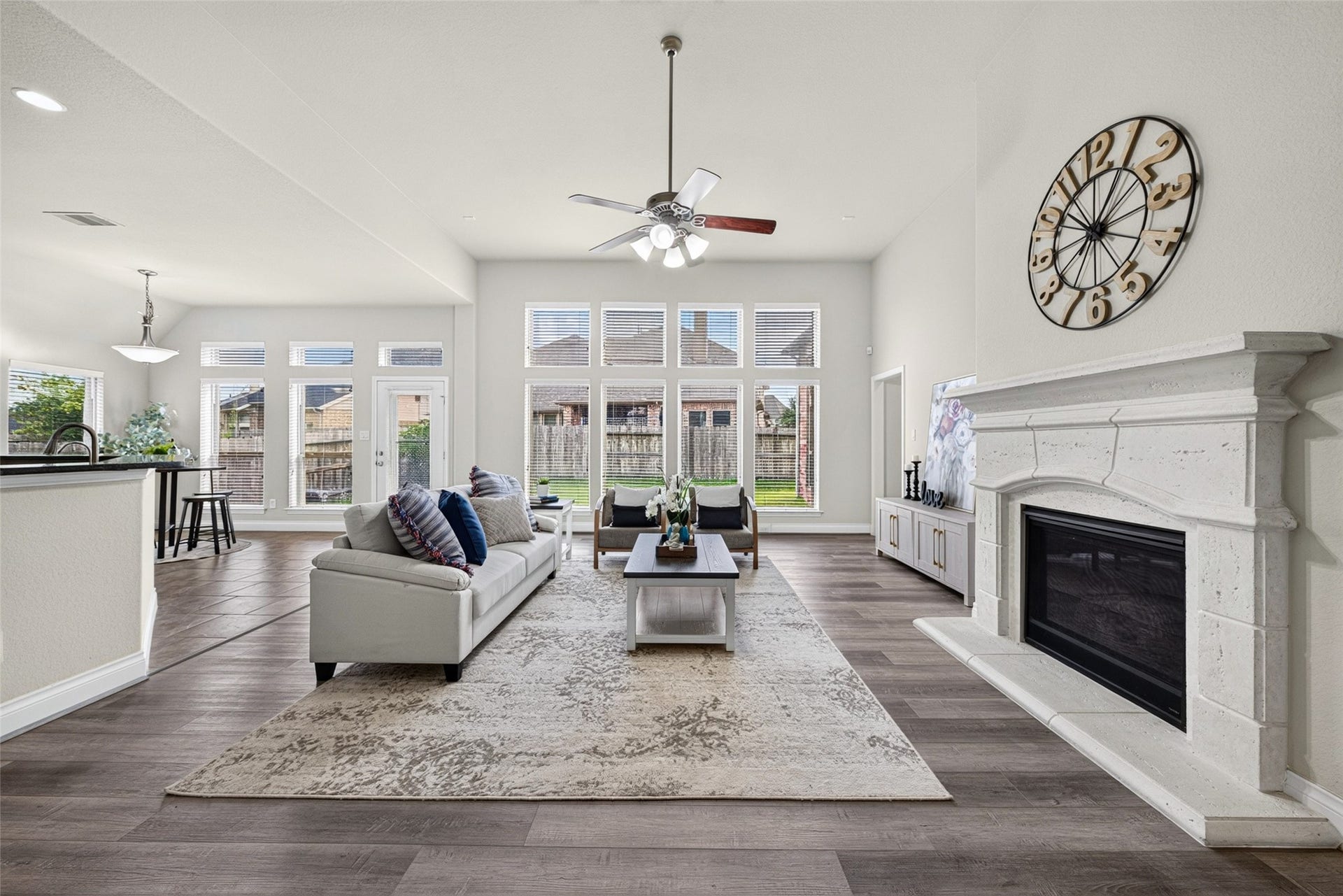 4003 Birch Vale Lane, Sugar Land, TX 77479 Open-concept main living area filled with natural light and finished with beautiful wood flooring.
