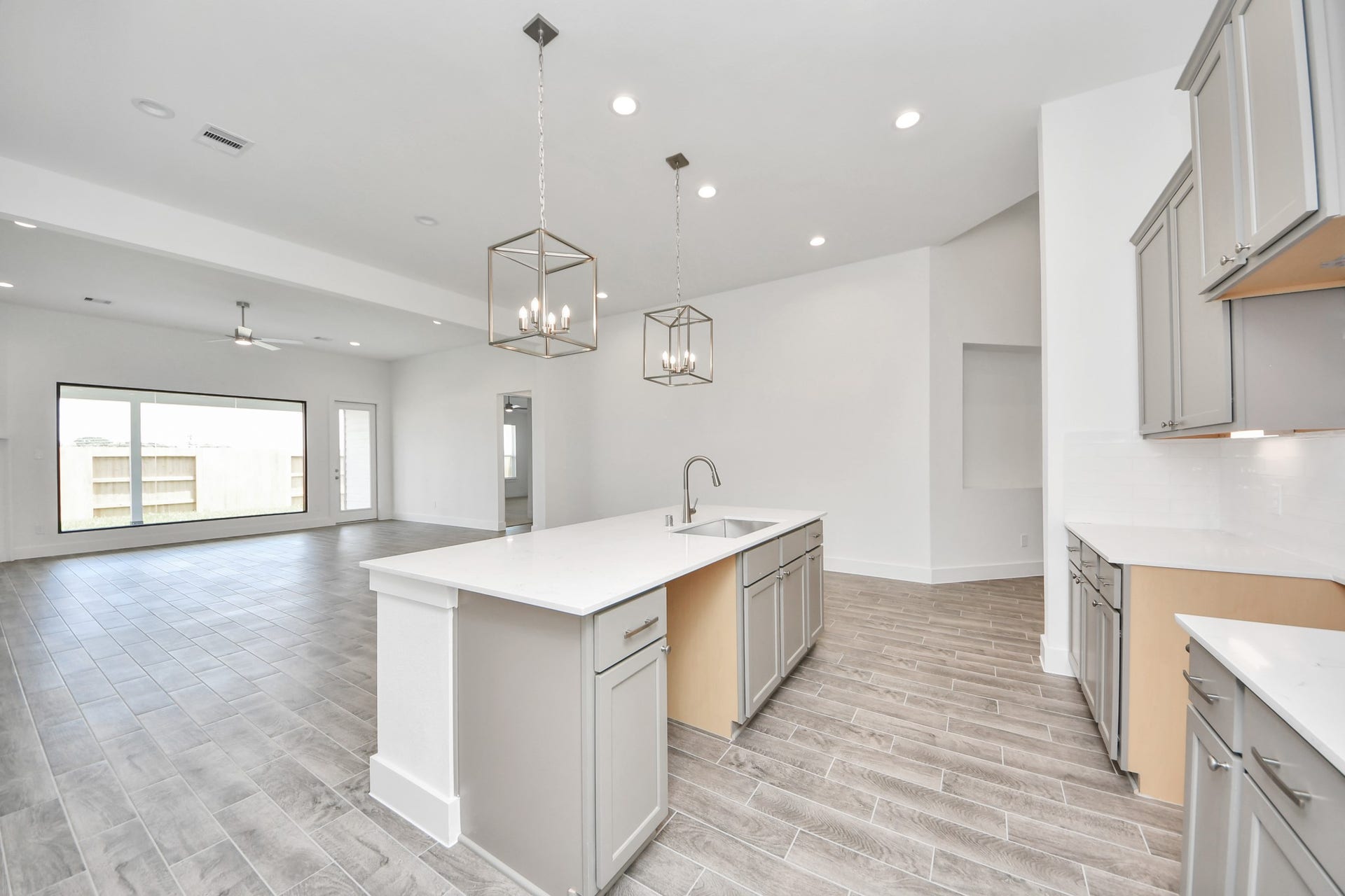 3201 Skerne Spring Drive, Spring, TX 77373 This generously spacious kitchen is a dream realized! Sample photo of completed home with similar floor plan. Actual colors and selections may vary.