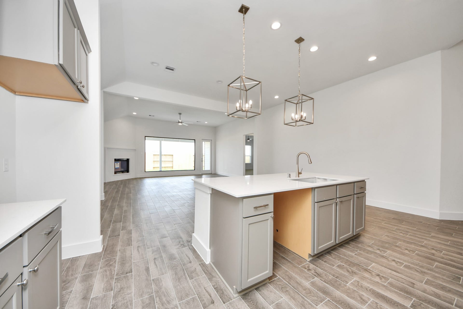 3201 Skerne Spring Drive, Spring, TX 77373 All of this overlooks your expansive family room, creating a perfect space for culinary delights and family gatherings. Sample photo of completed home with similar floor plan. Actual colors and selections may vary.